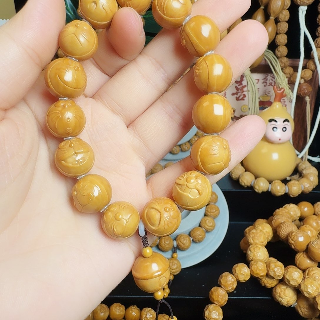 橄榄核手串拥****鼻机器猫手串