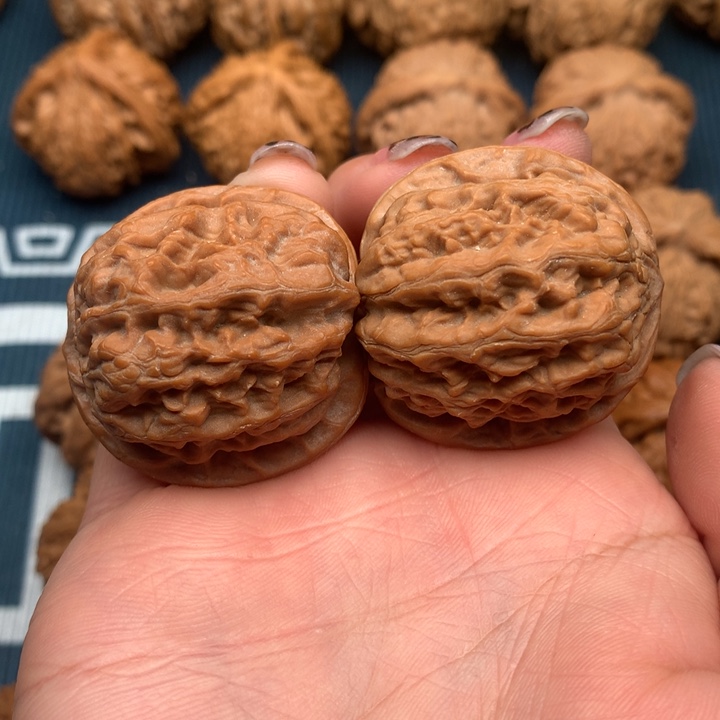 文玩核桃吊坠小***哥雪狮