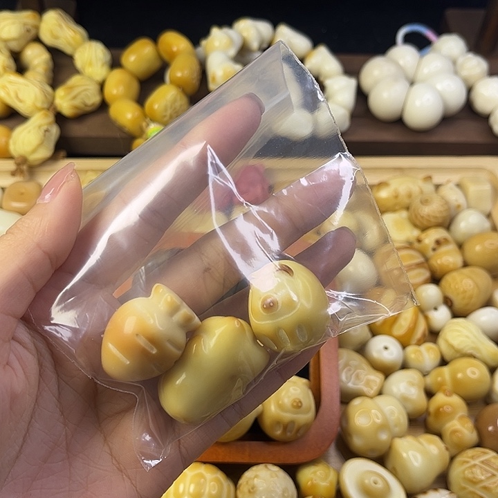 爱***萌吊坠菩提根/象牙果