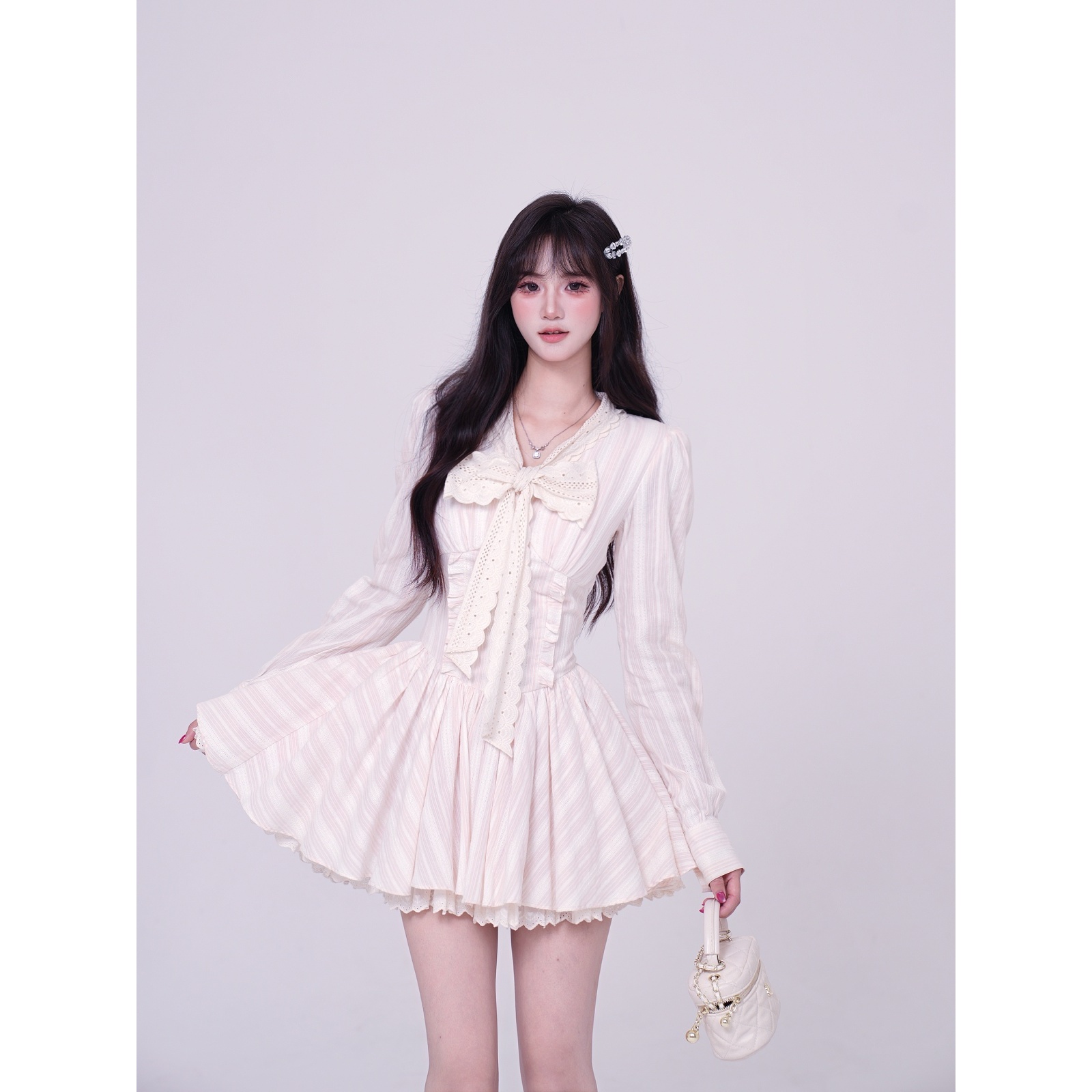 越韩小鱼 茶卡少女 法式甜美蕾丝边蝴蝶结长袖收腰粉色蓬蓬连衣裙