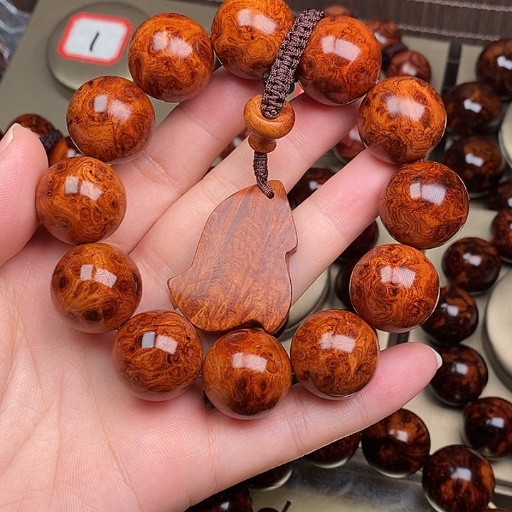 黎***前手串/手链花梨木类