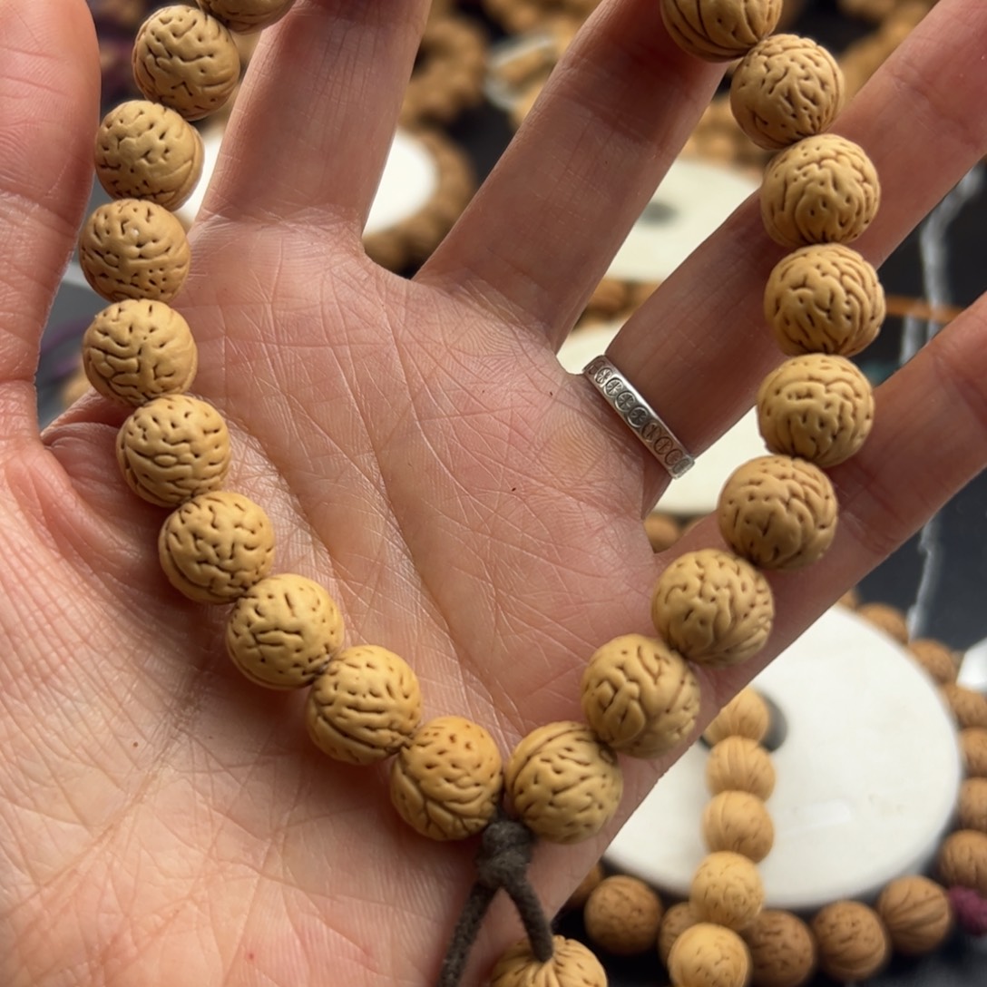 沝***燚手串桃核野生山桃核手串手链