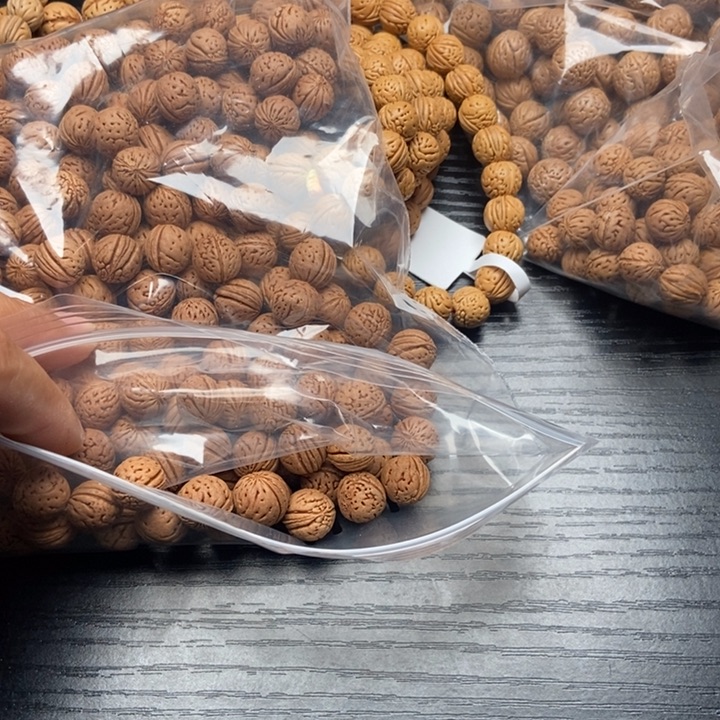 @***࿐东北野生小桃核散籽批发