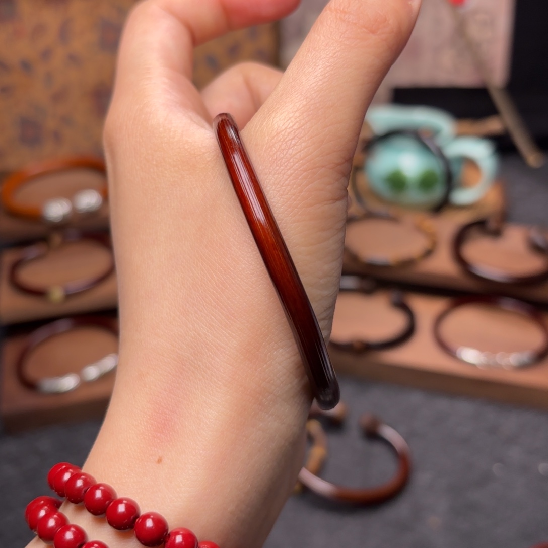 漯***睫木质非金属鸡血藤手镯