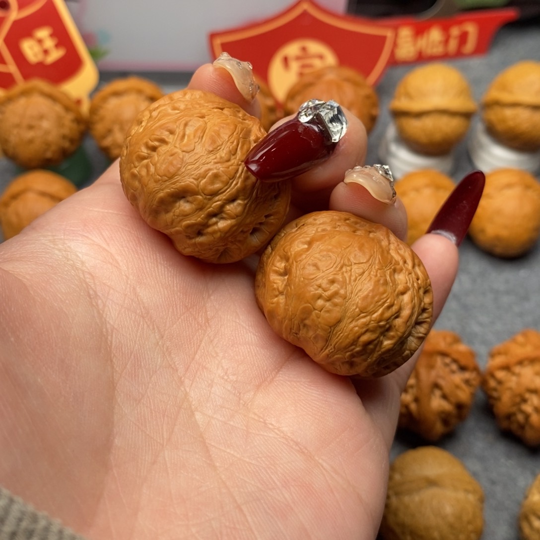 文玩核桃把件胖头元宝