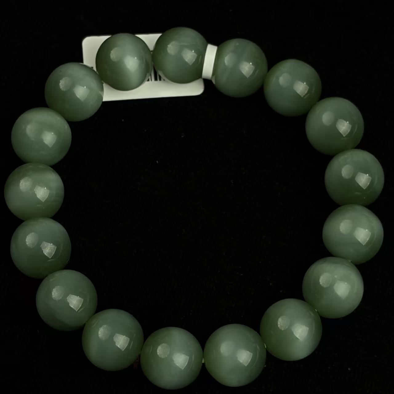 卡12猫眼碧绿手串D057