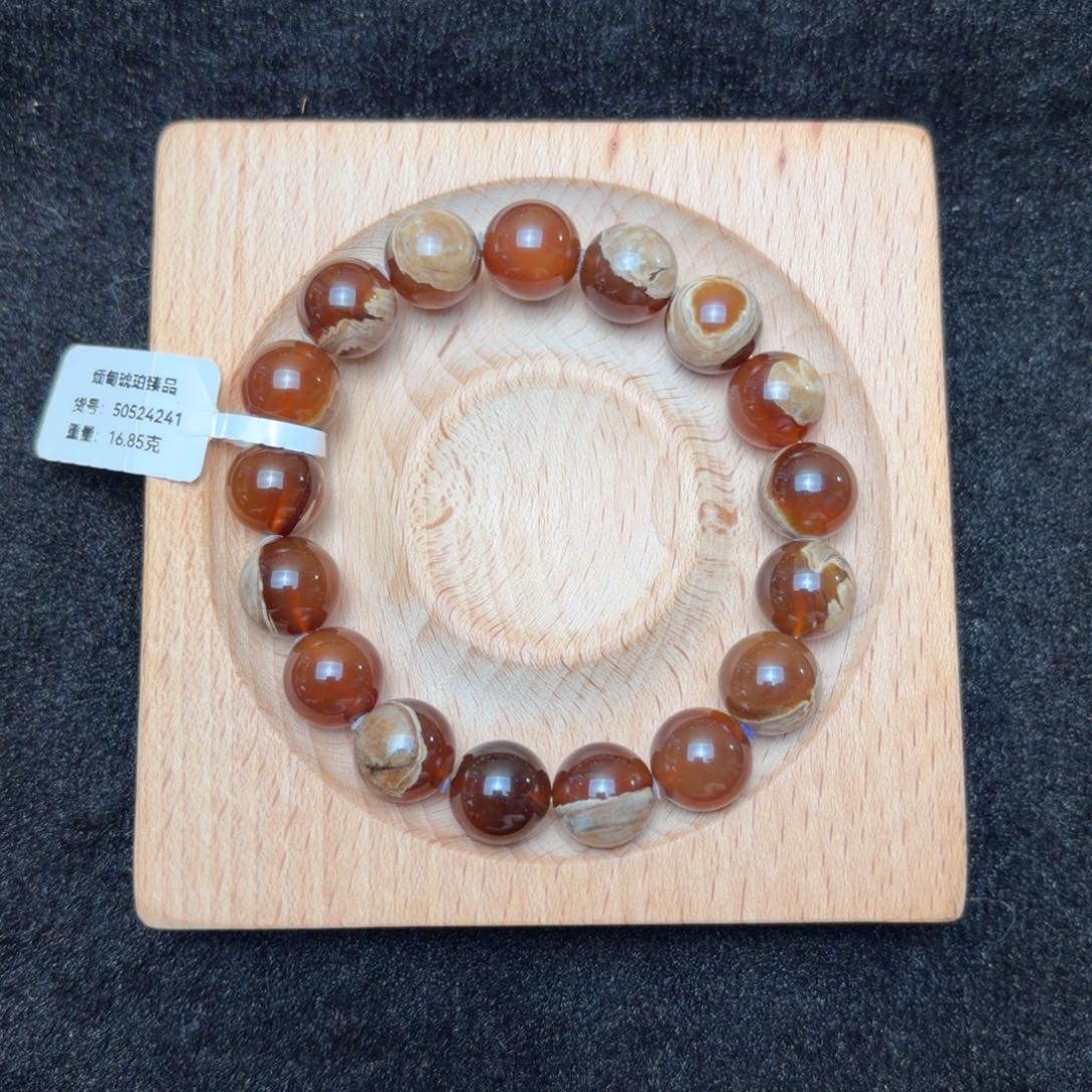 琥珀未镶嵌珠宝奇石12mm橘蜜油根溶洞