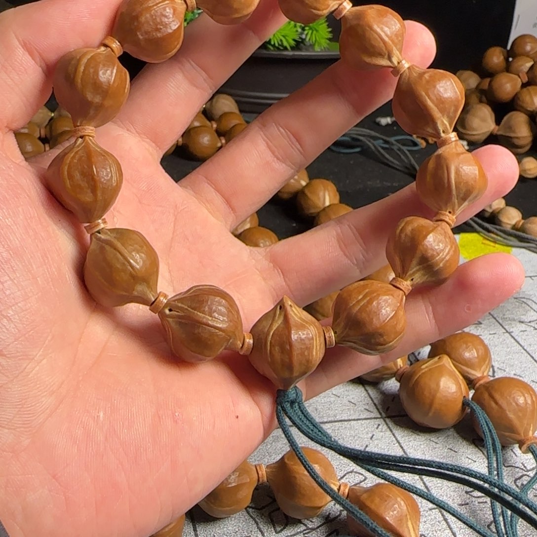 橄榄核1.7四花短圆铁核