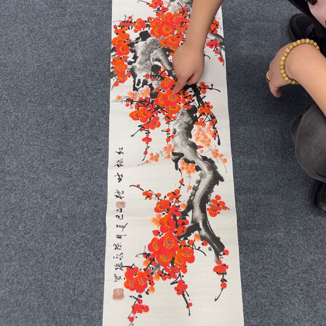 国画卖字画的小男孩