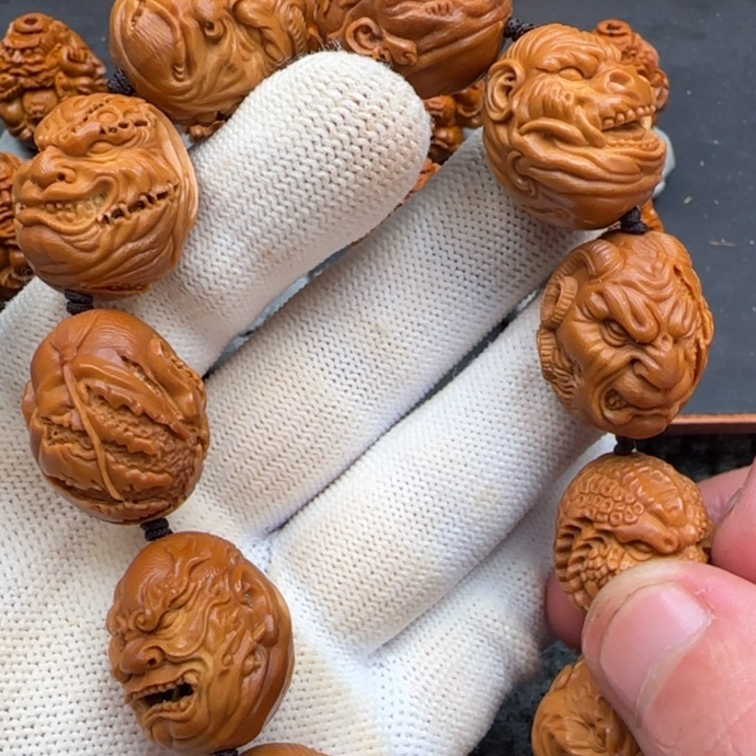 陈***6橄榄核手串/手链……………………