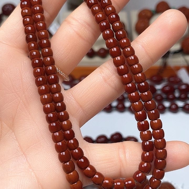 橄榄核手串诚**涯包浆玉化