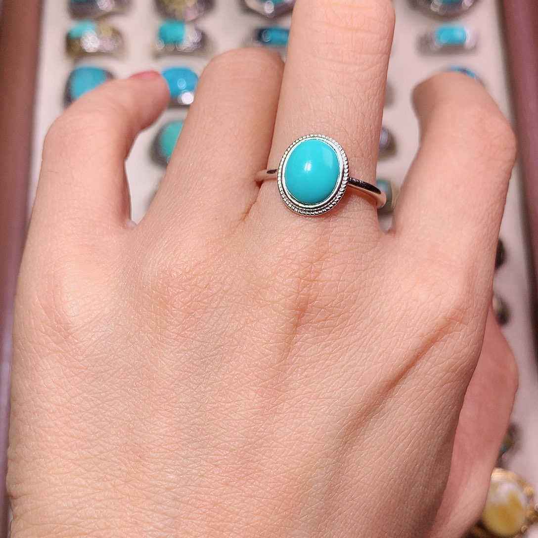 哈***银S925镶嵌绿松石挂件