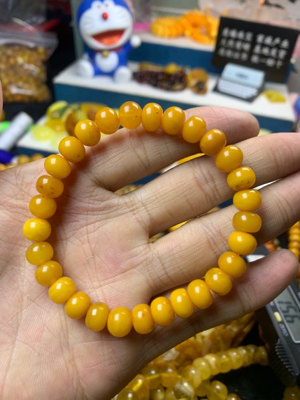 琥珀蜜蜡鸡油黄算盘珠手串