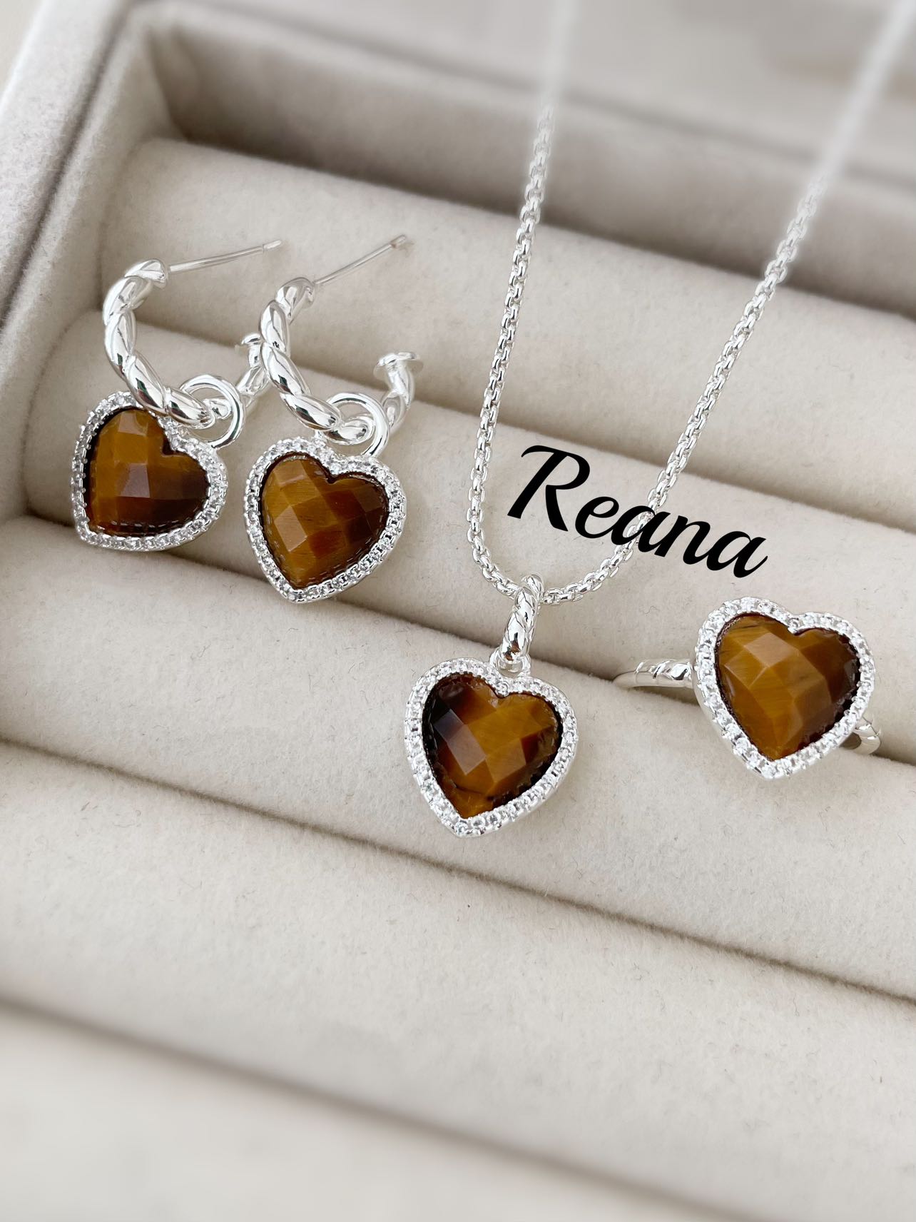 钛钢耳饰 切面桃心（虎眼）