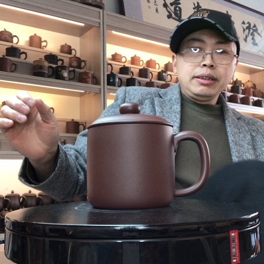 刘***溜紫泥茶杯微瑕容量480