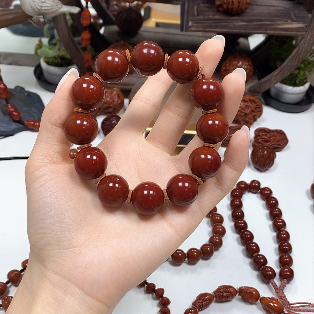 橄榄核把件饺*?光珠手串