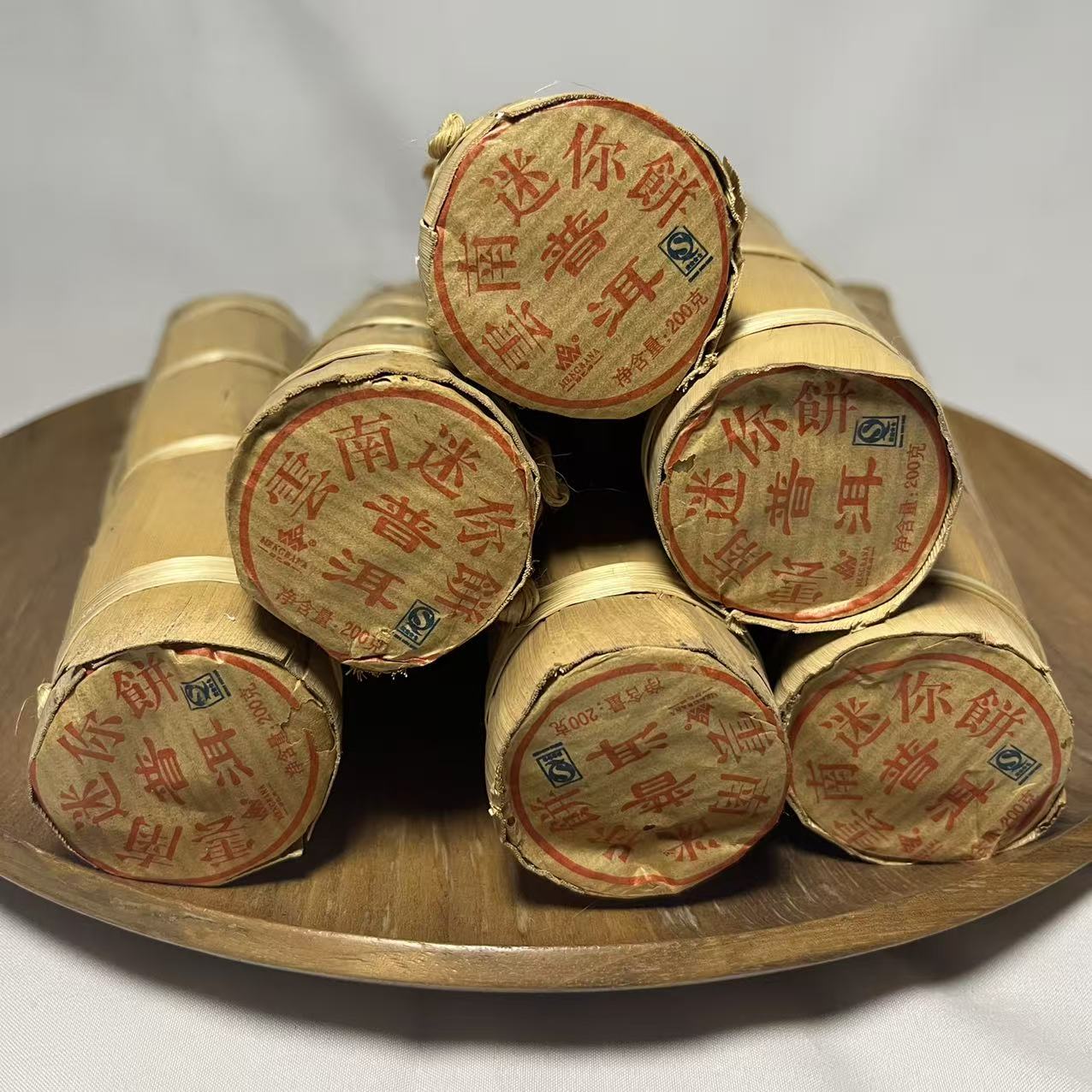 【秋冬黄金搭档】09年金不换饼干熟茶200g/柱（送同款茶样）