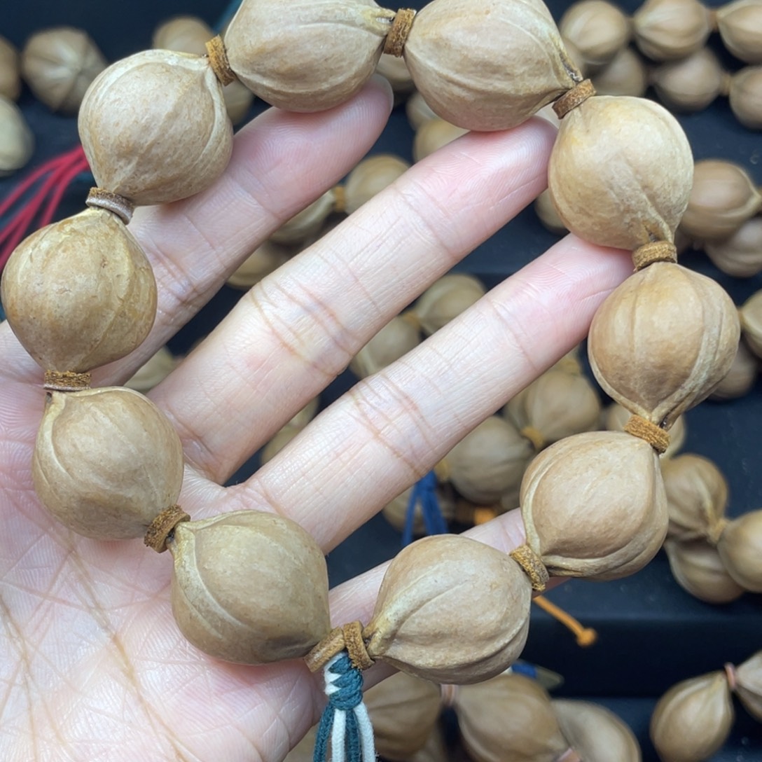 明***好001橄榄核三花21*25