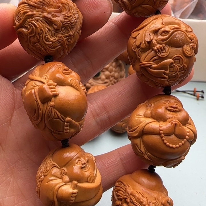 橄榄核手串一****ಣ雕刻精美艺术