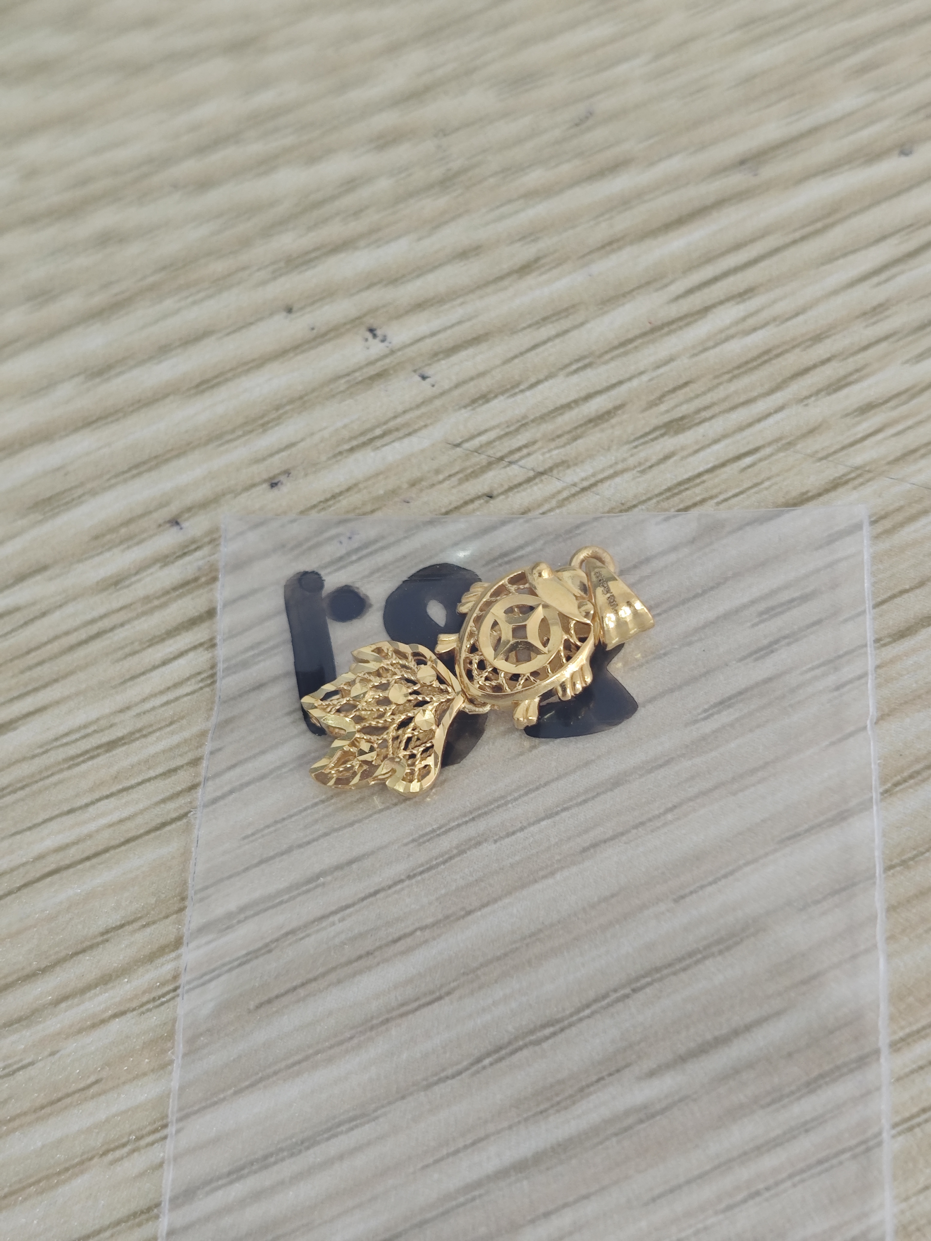 足金999 镂空小鱼吊坠1.83 