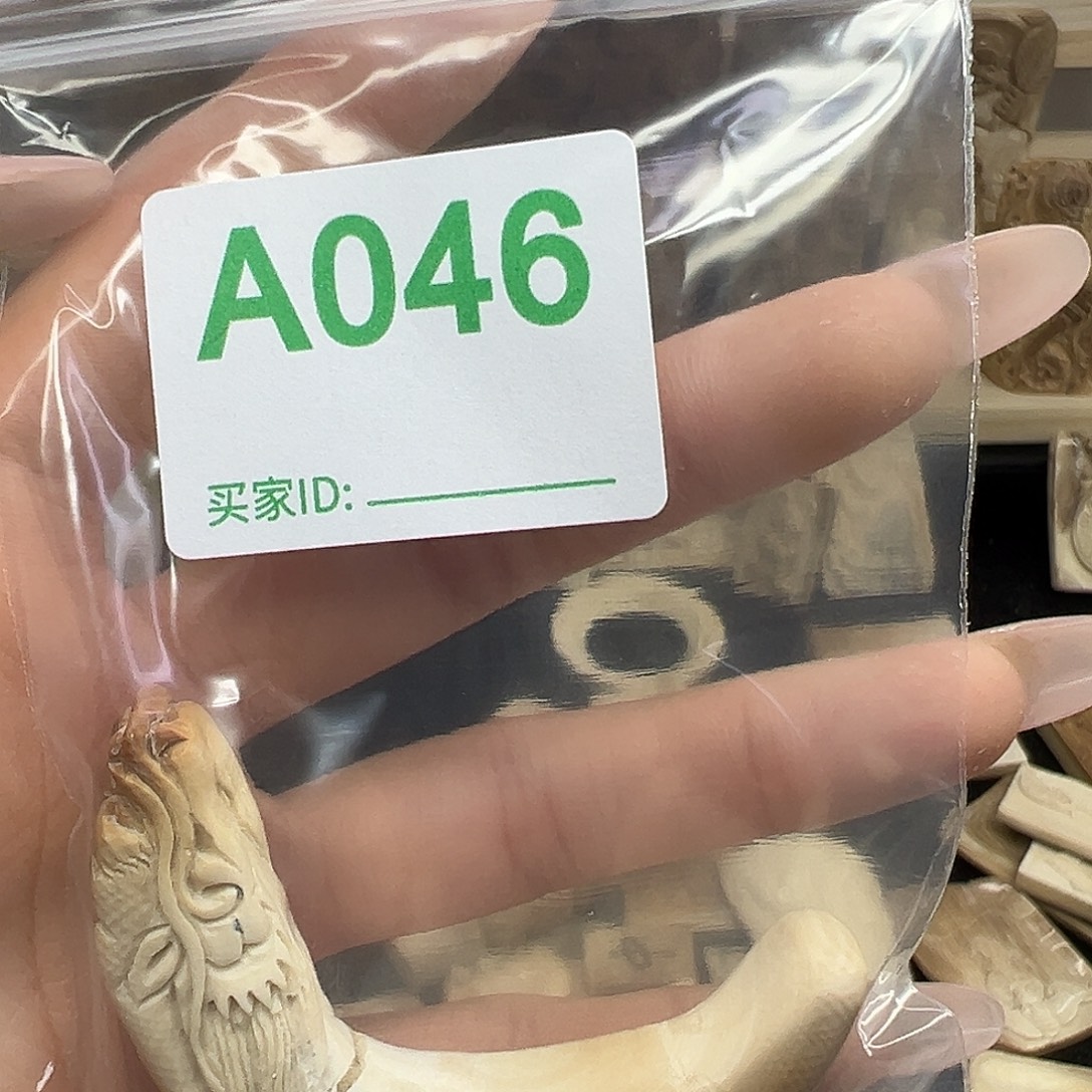 胡***理天然猛犸牙雕刻品