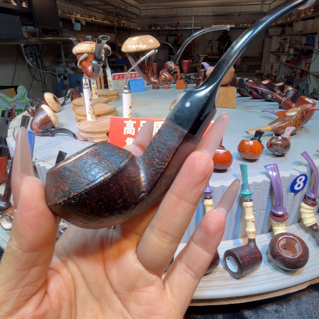 荆****、焦耀烟斗一牛头