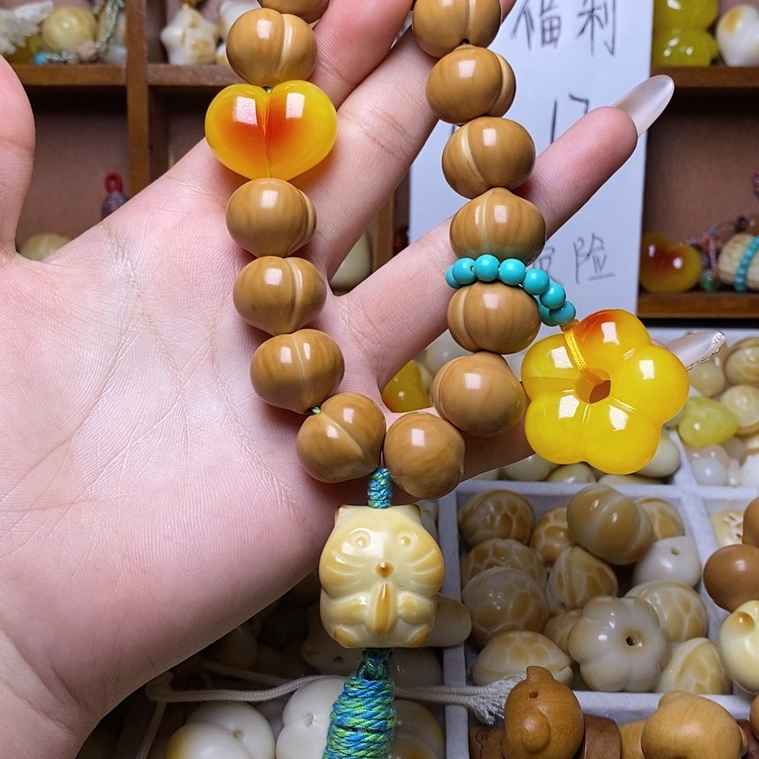 黎***猴头核桃吊坠18光