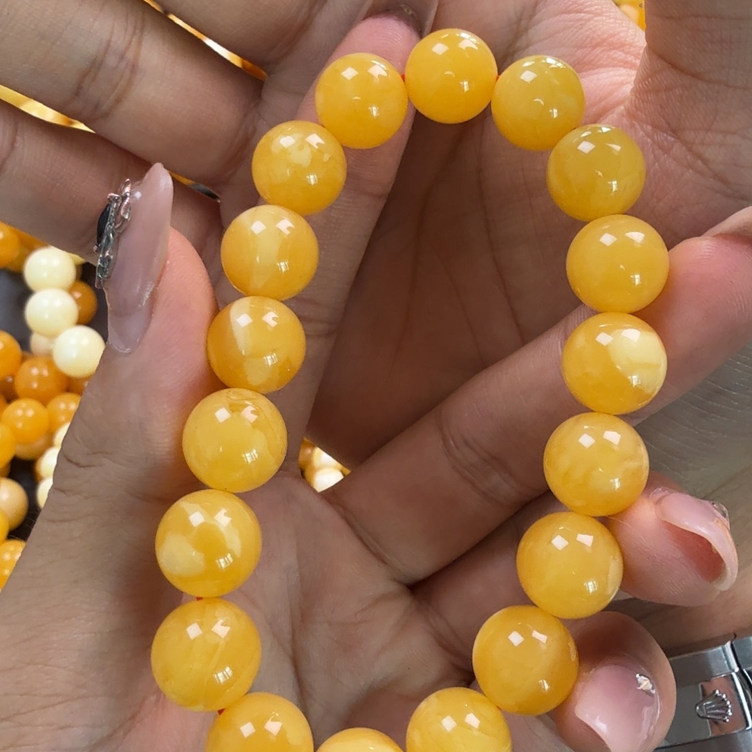 柚***锅蜜蜡未镶嵌珠宝奇石