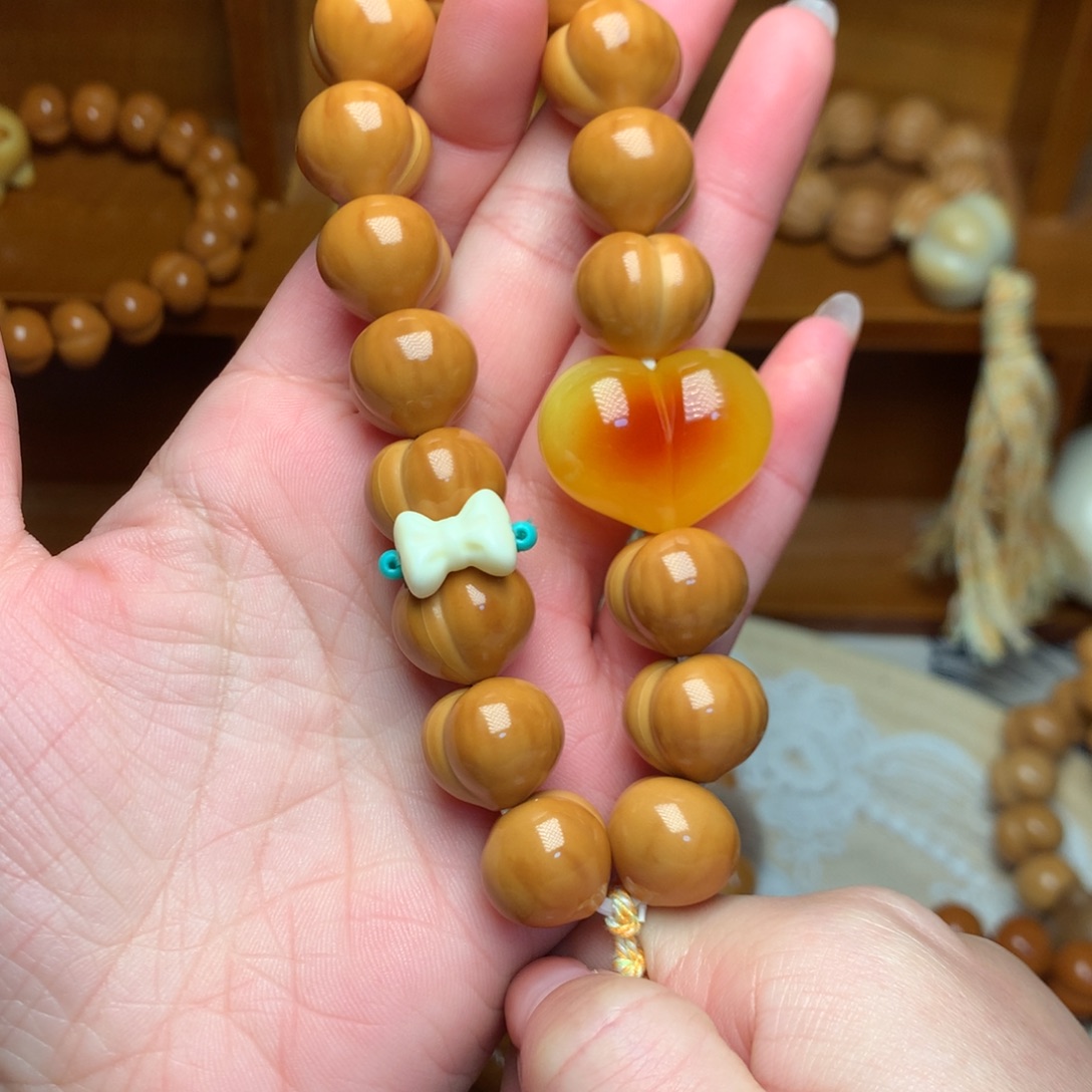 猴头核桃把件15高定屁桃手持爱心蝴蝶结跑环