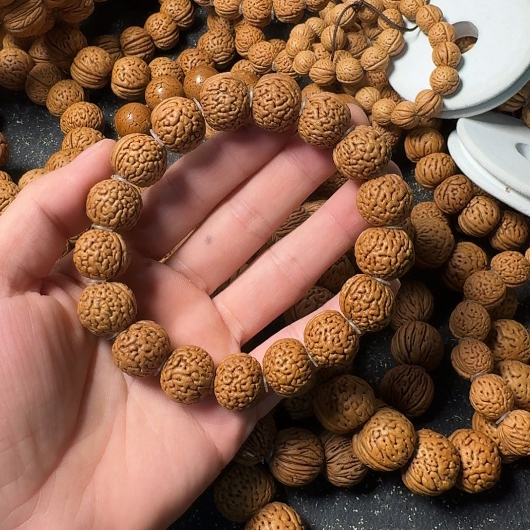 百***贝吊坠桃核圆周率手串