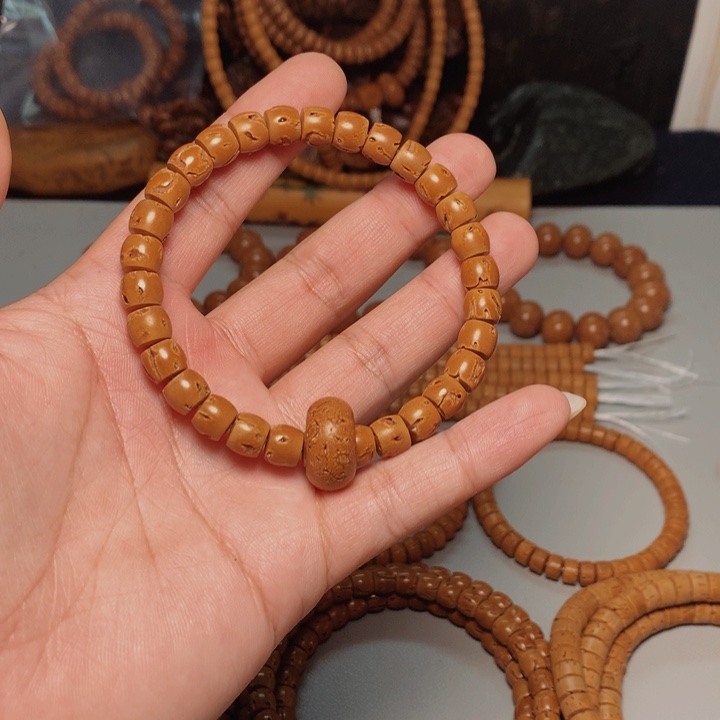 桃核吊坠波**尔桃核手串87镶嵌