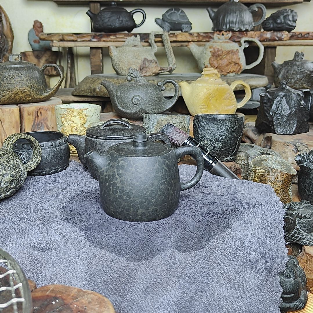 紫砂茶杯蜡***舅冰碛岩汉铎壶