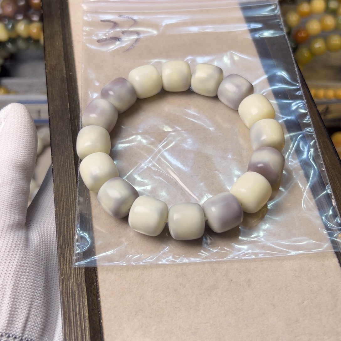 斗***战手串菩提根/象牙果23号香芋糖正桶瓷料卡14  深紫或有色线