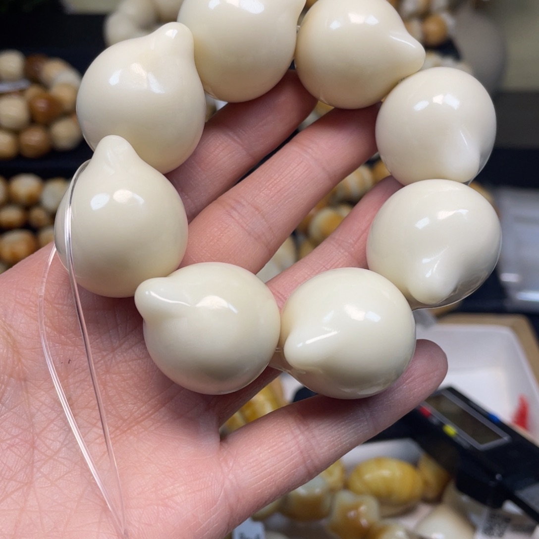 菩提根/象牙果手串102大猫头微瑕