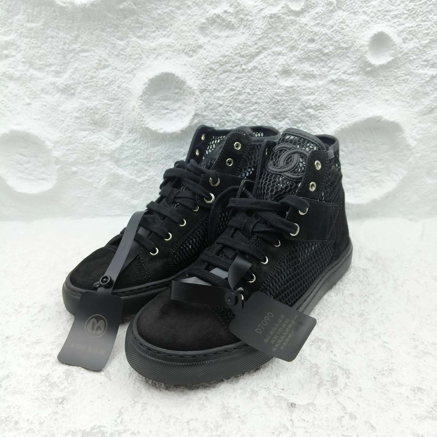 99新 Chanel/香奈儿 l6黑色镂空高帮板鞋/非全新