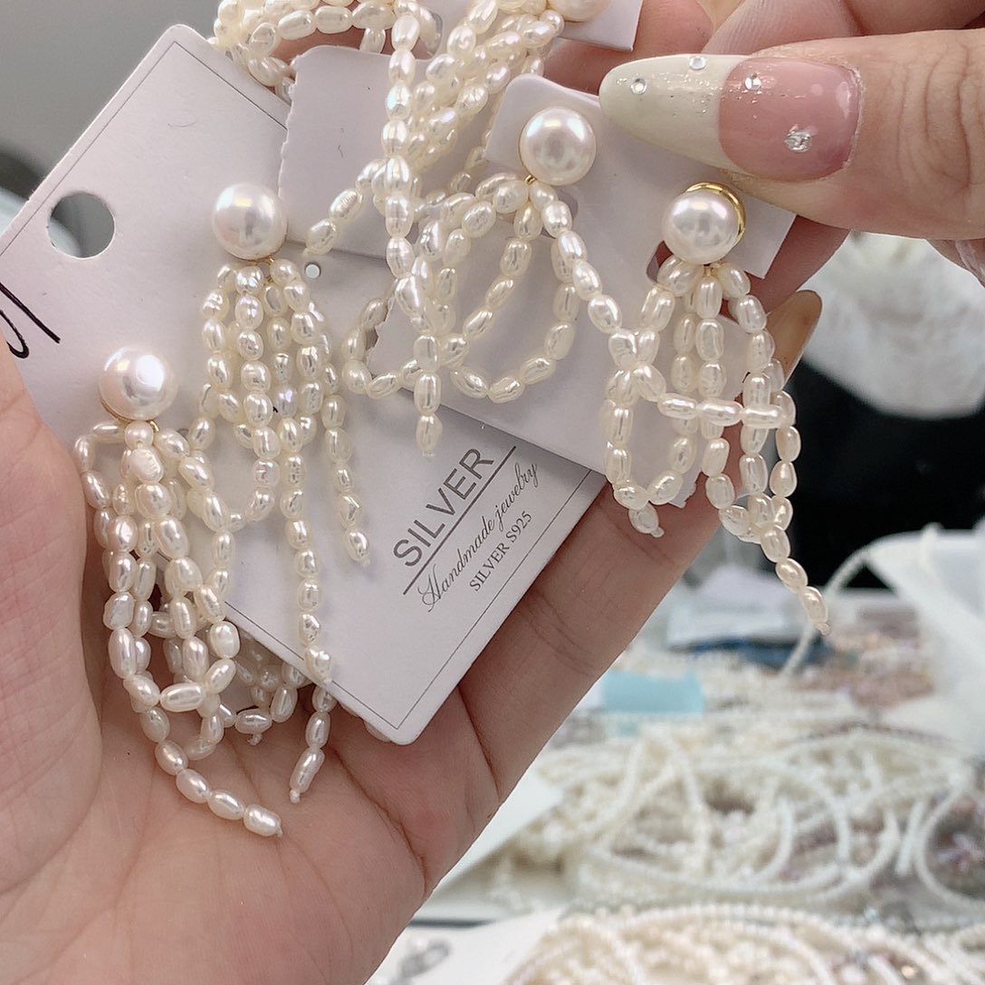 银S925镶嵌耳饰淡水珍珠流苏蝴蝶结