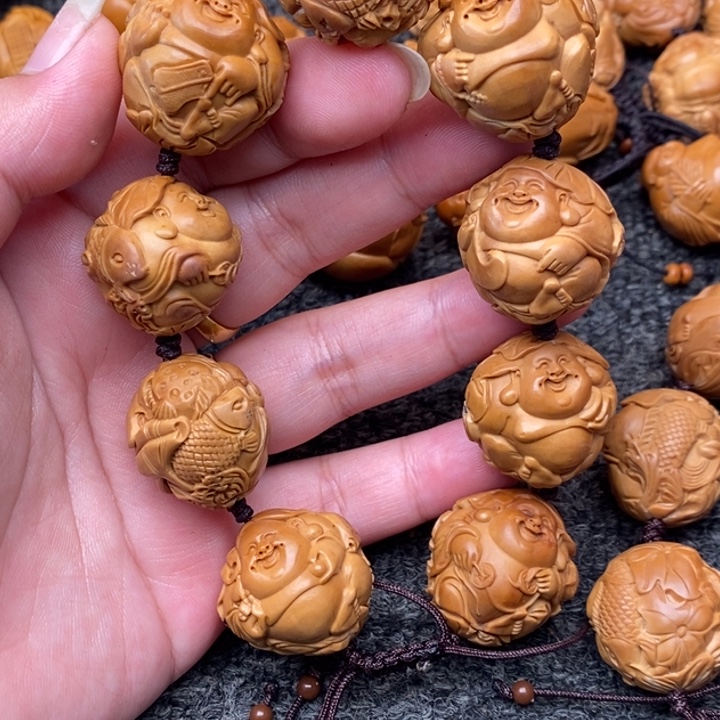 橄榄核吊坠根据经济旅途快乐咯了