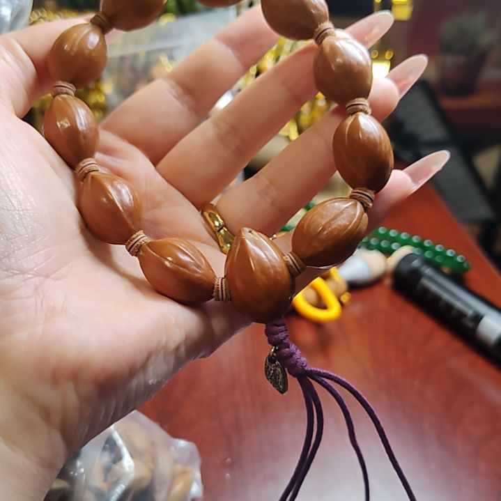 就****橄榄核吊坠四花手串