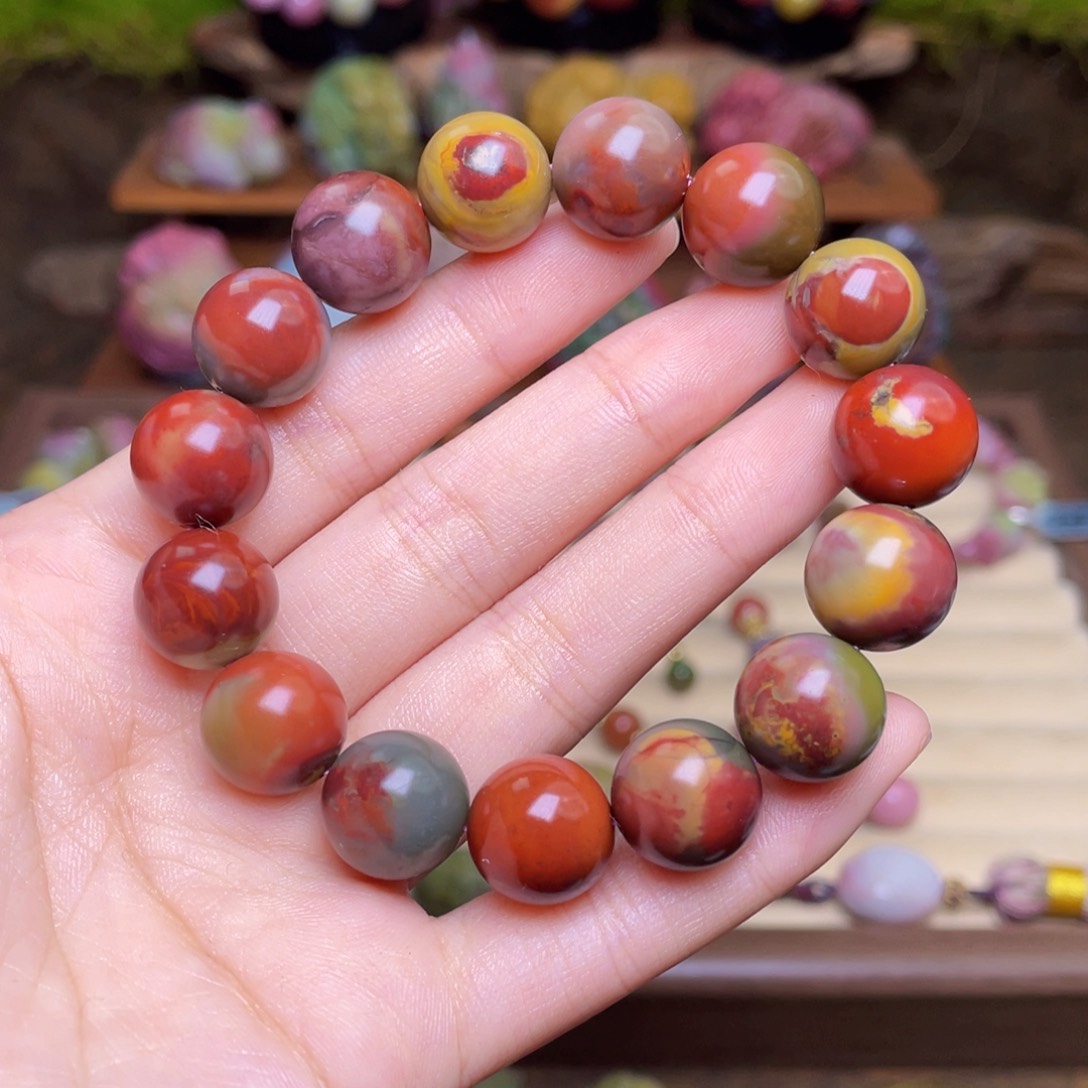 瑄***瑄玛瑙/玉髓未镶嵌珠宝半成品盐源玛瑙炫彩彩浆包浆串