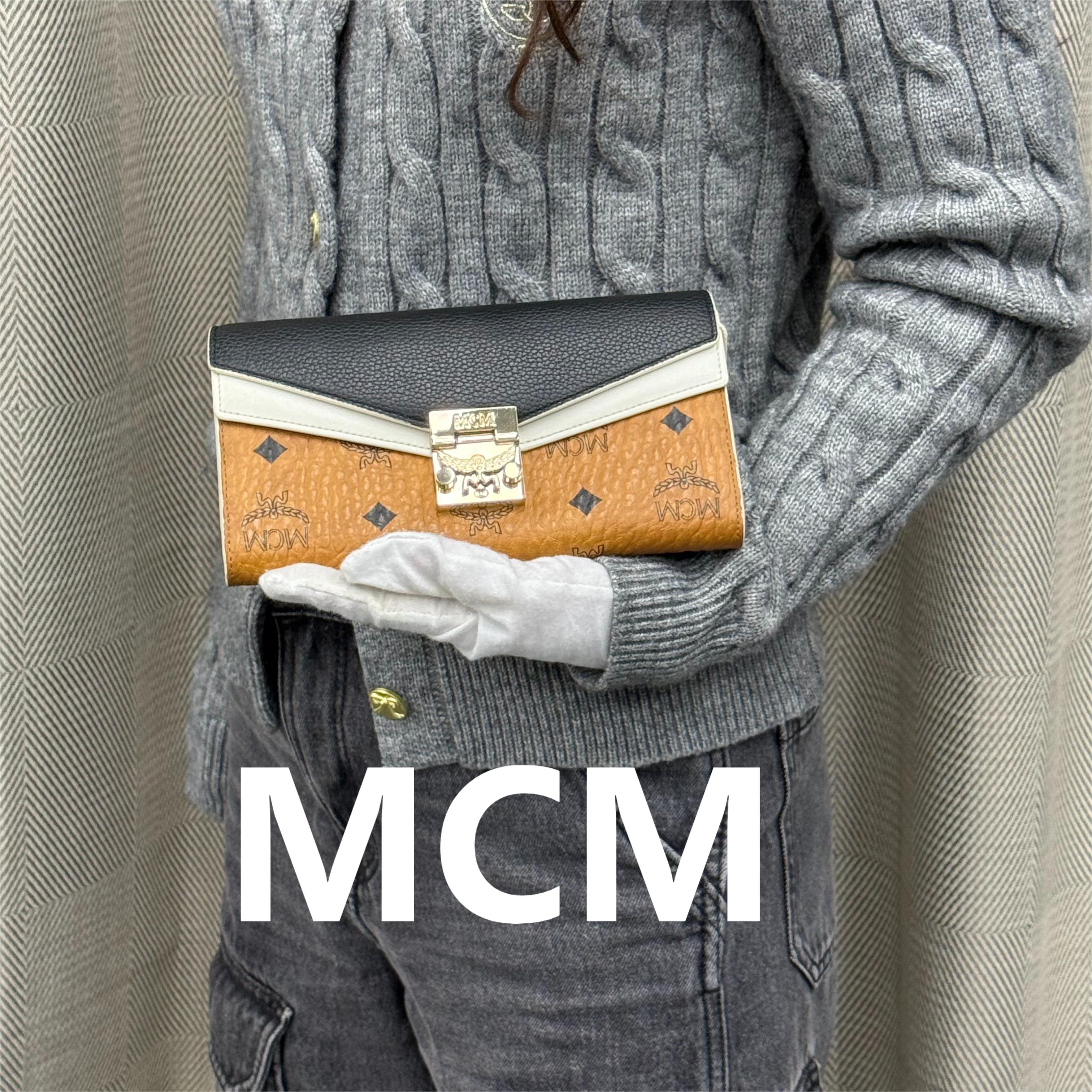 95新 MCM 老花黑白拼色涂层帆布月桂树扣手拿包/云海优选/54877