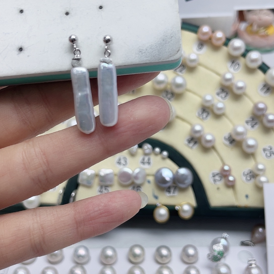 小***子淡水珍珠耳饰银S925镶嵌