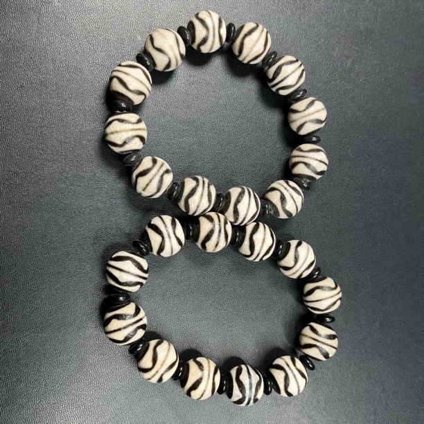 H211藏式双牙牙手串卡16mm左右，以实物为准，多样性发其一