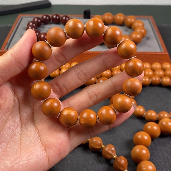 橄榄核手串正圆光珠1.4