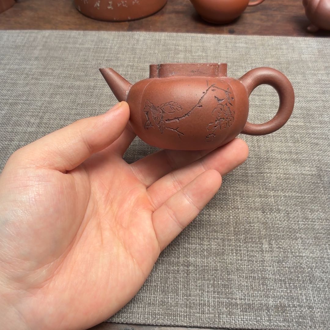 紫砂茶壶铁画轩 狮球壶身桶