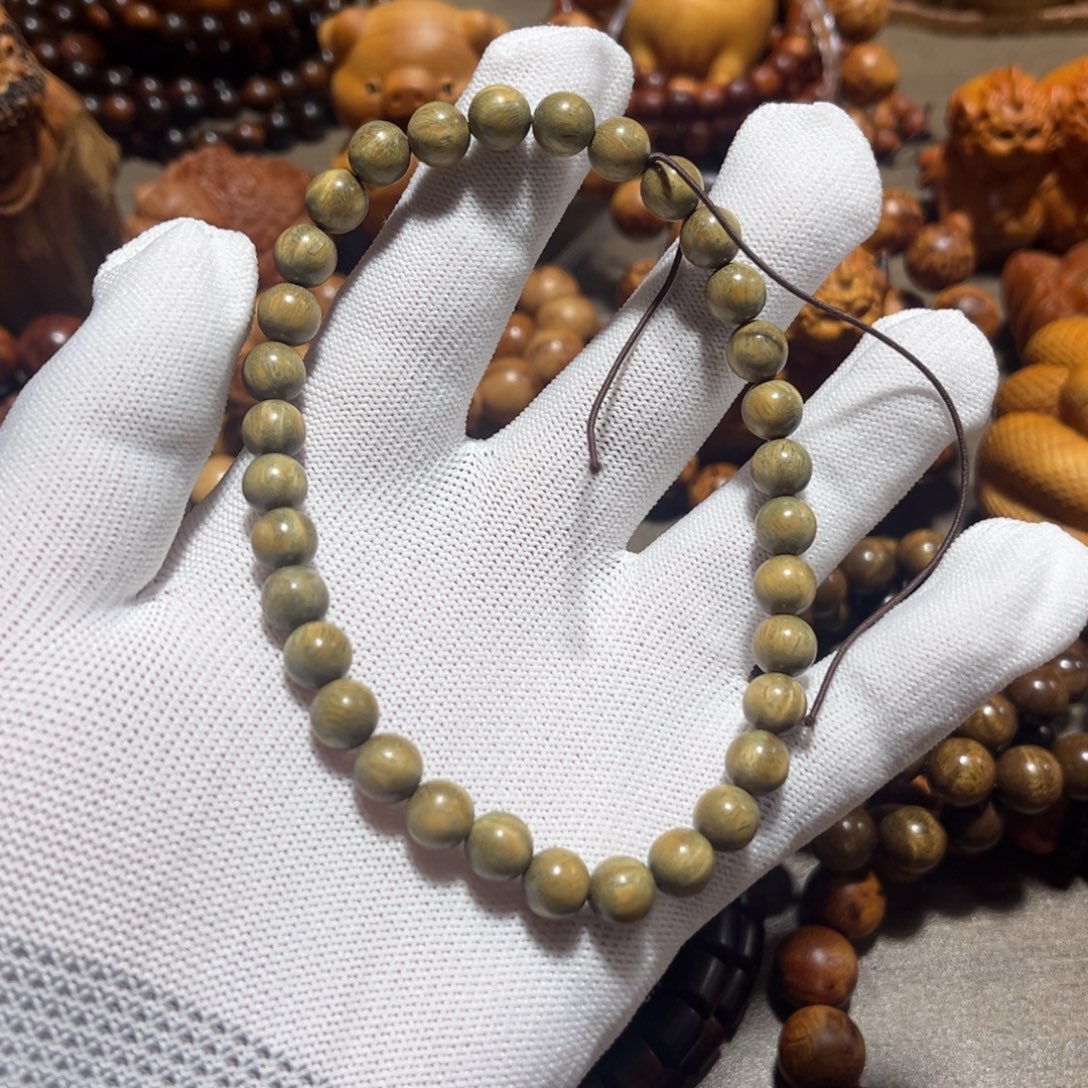 灿***)柏木（崖柏）绿檀，0.8，24颗