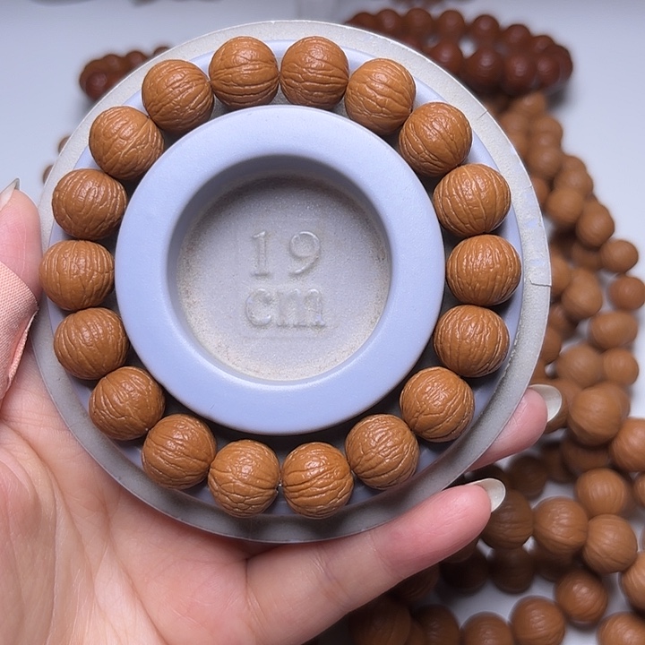 用***4吊坠猴头核桃14+同尺凤羽手串