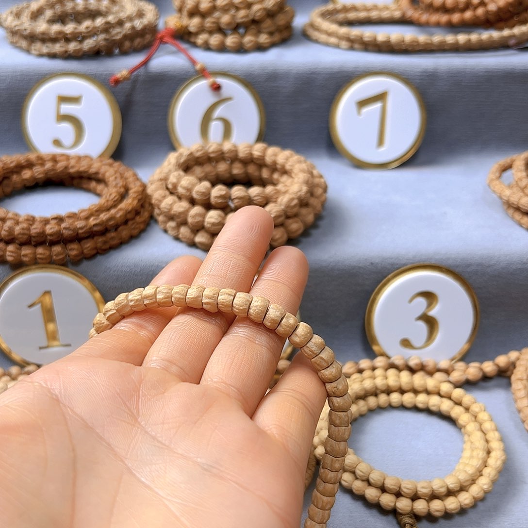 柏香籽/百香籽手串刂****