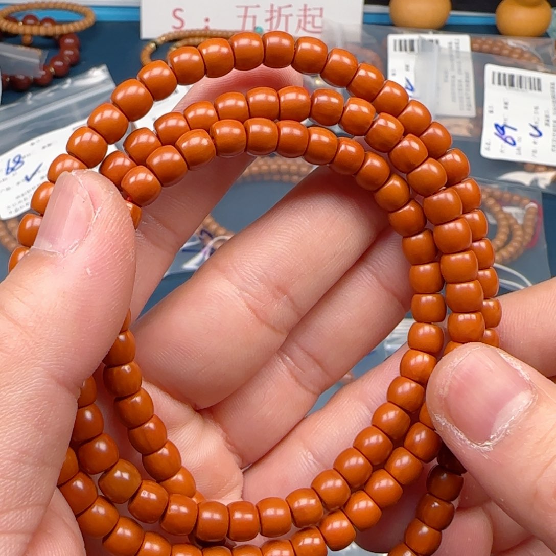 十***雪手串橄榄核老挝S+级核尖直切尺寸6.7