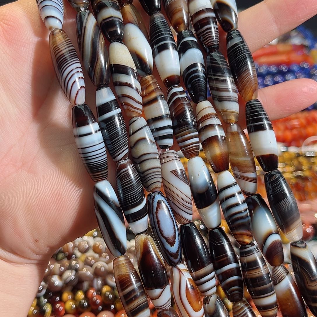 玛瑙/玉髓未镶嵌珠宝半成品蚕丝玛瑙天珠一条10x30mm