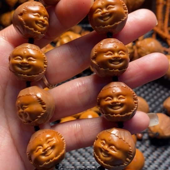 橄榄核吊坠包衣开心